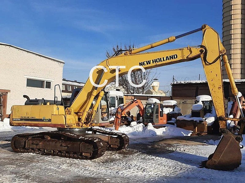 Kobelko SK250:  Масса 24700 кг   Глубина коп. 7 м.             Ковш 1,2 м3